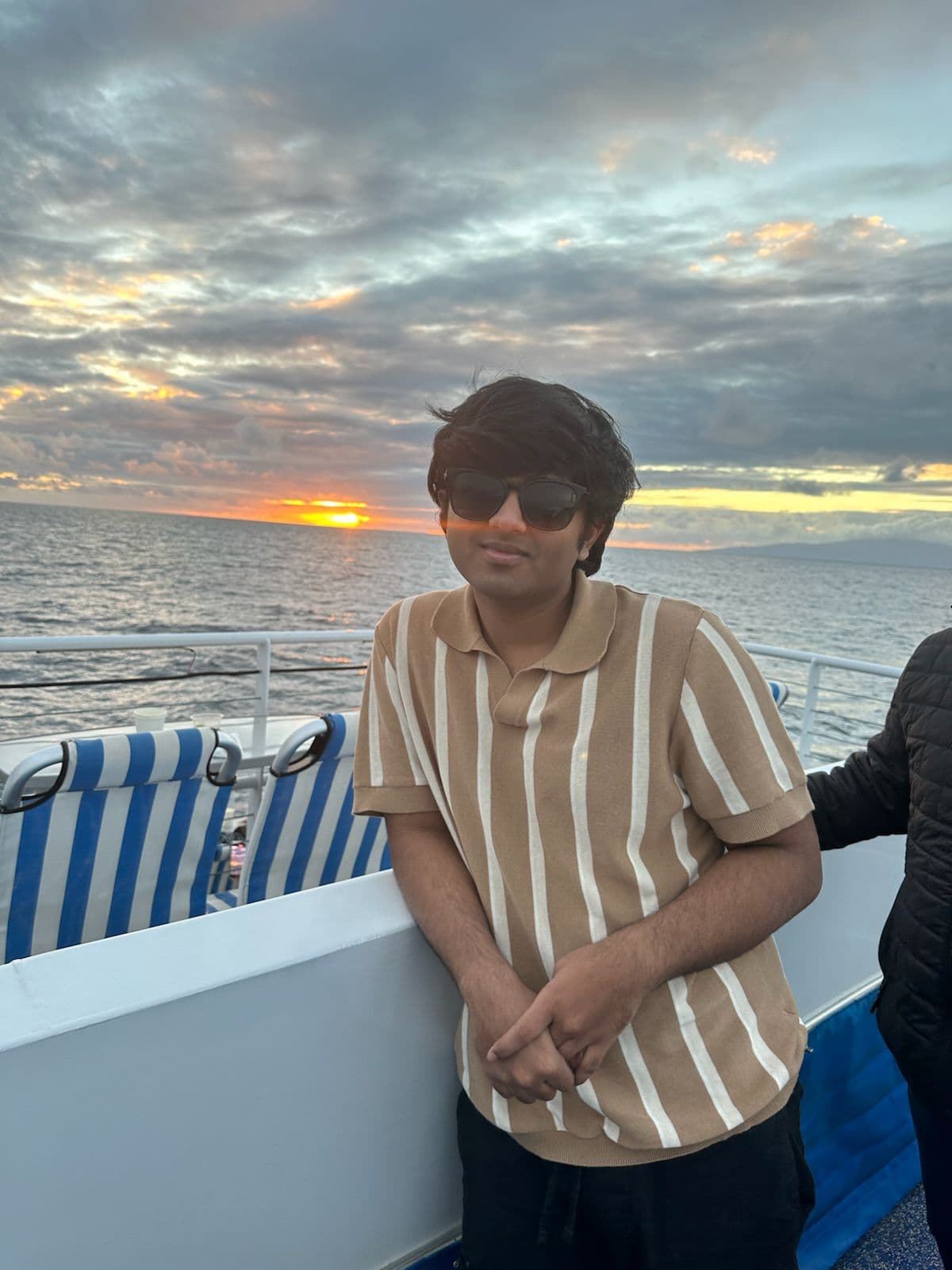 Anikhet Mulky at an ocean sunset